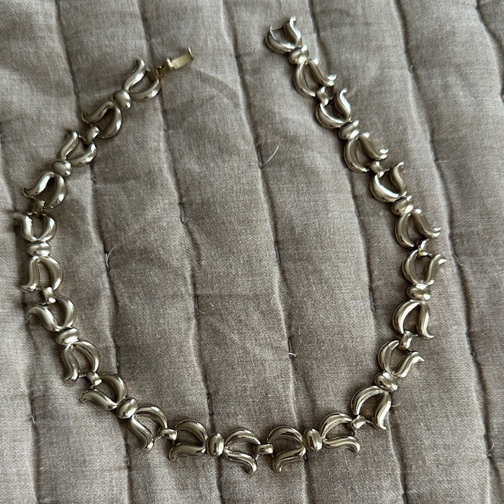Gold tone bow Necklace